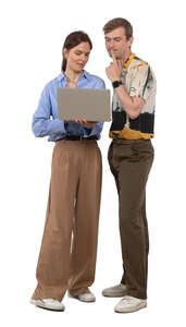 two cut out young people standing and looking at laptop