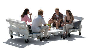 cut out backlit scene of friends sitting in a hipster cafe