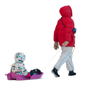woman pulling a sledge with her child