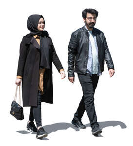 middle eastern man and woman walking