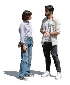 dark-haired man and woman standing and talking