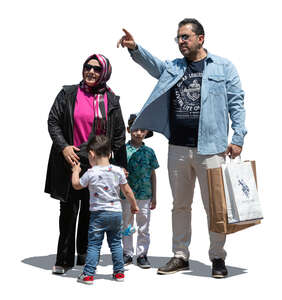 cut out middle eastern family standing and looking in one direction