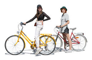 two cut out teenage girls with bikes standing