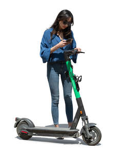 woman standing next to an electric scooter