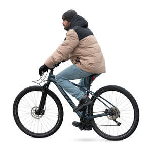 cut out man riding a bike in winter