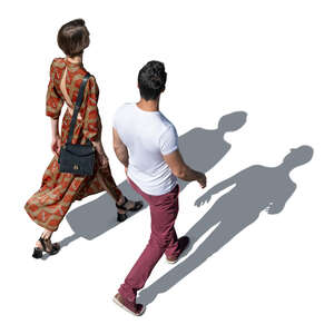 two people walking hastily seen from above