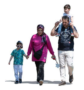 cut out middle eastern family walking in partial sunlight