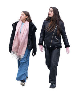 two young women walking in late autumn