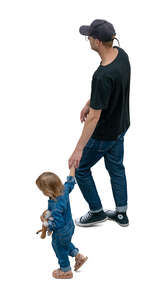 top view of father and daughter walking hand in hand