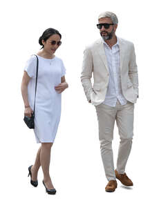 man and woman in posh white clothing walking