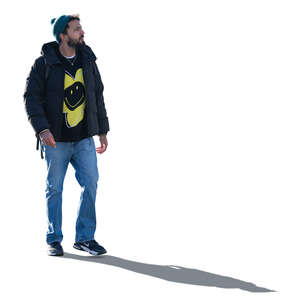 cut out backlit indian man walking