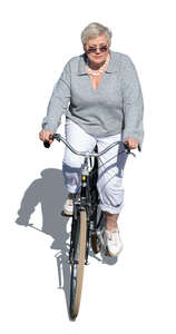 cut out older woman riding a bike seen from above