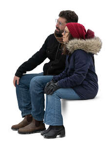 two people sitting in winter