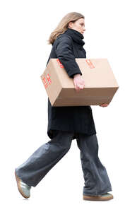 woman walking and carrying a large carton box