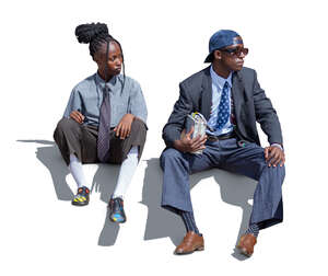 cut out black man and woman sitting outside