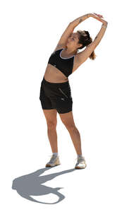 cut out backlit woman exercising outside