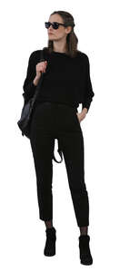 cut out woman dressed in black standing