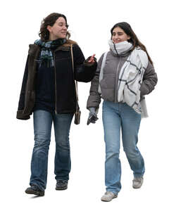 two young women walking on a chilly day