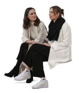 two women in spring sitting and talking