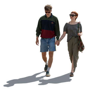 cut out backlit hipster couple walking hand in hand