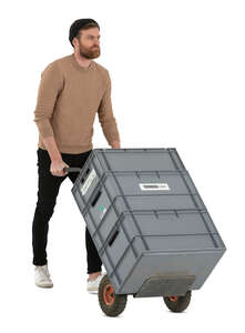 cut out man pushing a box trolley