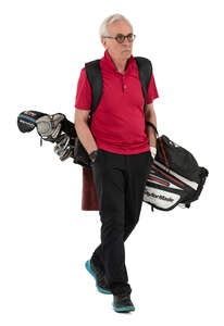 senior gentleman with a golf bag walking