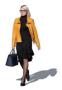 woman with a yellow jacket walking