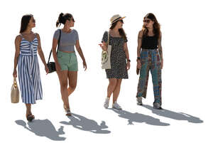 four backlit women walking