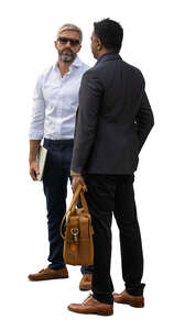 two men talking after a work meeting