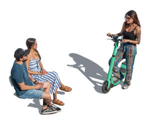 top view of a woman with scooter talking to two friends