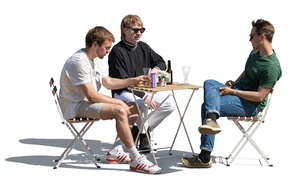 group of men sitting and drinking beer