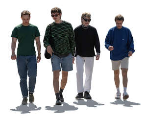 cut out backlit group of young men walking