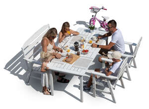 top view of a family eating breakfast outside in summer