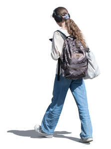 cut out teenage girl walking and listening to music