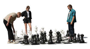 cut out group of young people playing chess street game