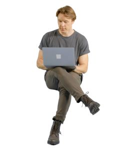 video of a man with a laptop sitting