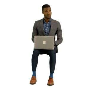 cut out video of a black man sitting and working with computer
