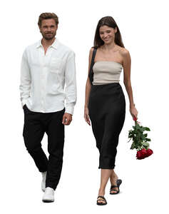 man and a woman with flowers walking happily