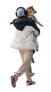 cut out woman carrying a dog