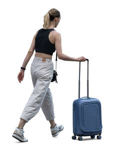 cut out woman with a suitcase walking