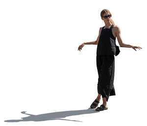 cut out backlit woman leaning on a balcony railing