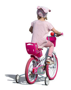 little girl in pink riding a pink bike