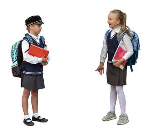two cut out pupils standing and talking