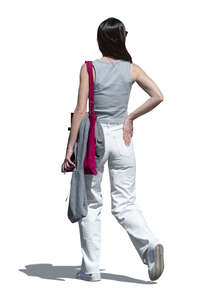 cut out dark haired woman walking in summer