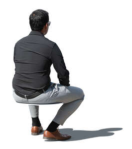 cut out man in formal business outfit sitting outside