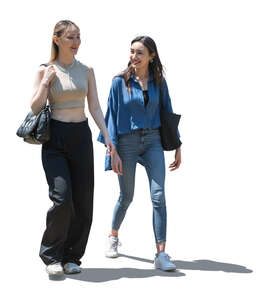 two backlit women walking and talking