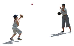mother and daughter playing an outdoor sports game