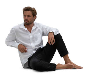 man sitting casually on a sofa