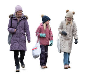 woman and two girls walking in winter