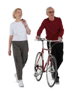 cut out elderly couple with a bike walking